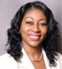 Photo of PNCB CEO Sheri Sesay-Tuffour in a white suit